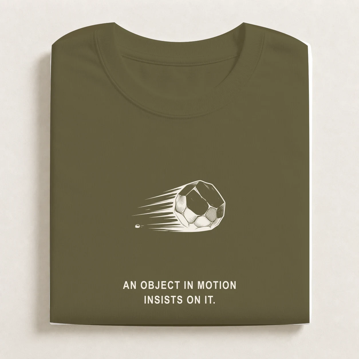 Conservation of Momentum printed on a folded Army T-shirt.